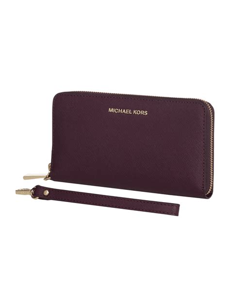 michael michael kors wristlets geldbörse aus leder pflaume|michael kors gold wristlets women.